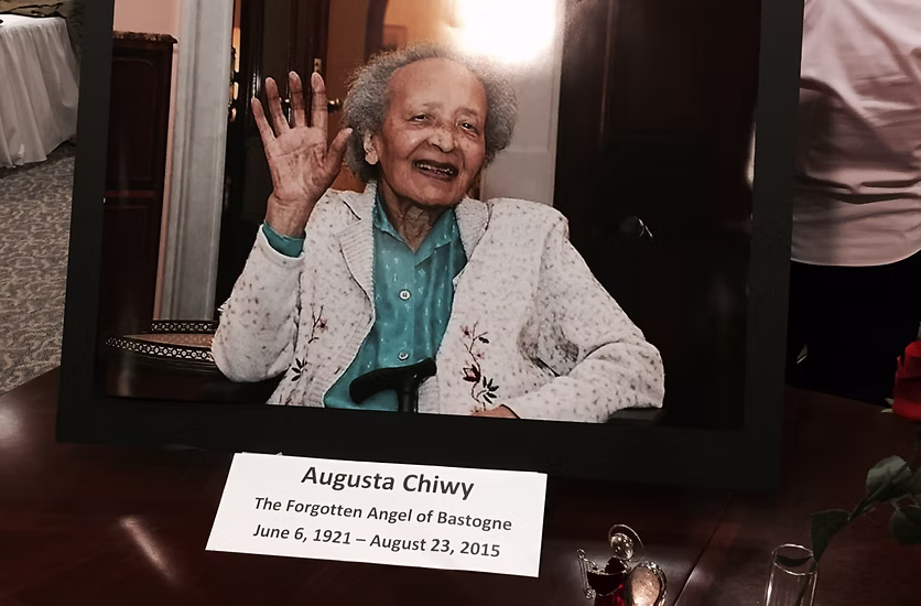 Augusta Chiwy, the forgotten angel of bastogne, smiling and waving
